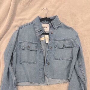 vintage light wash denim jacket never worn